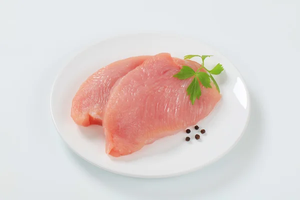 Raw turkey breast steaks — Stock Photo, Image