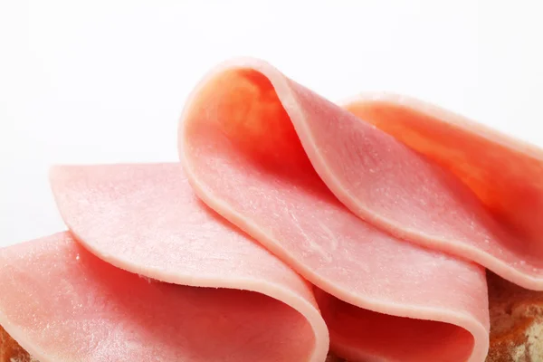 Slice of bread with ham — Stock Photo, Image