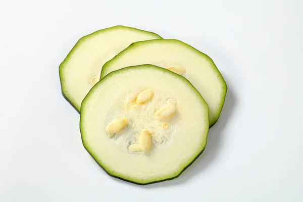 Three slices of zucchini — Stock Photo, Image