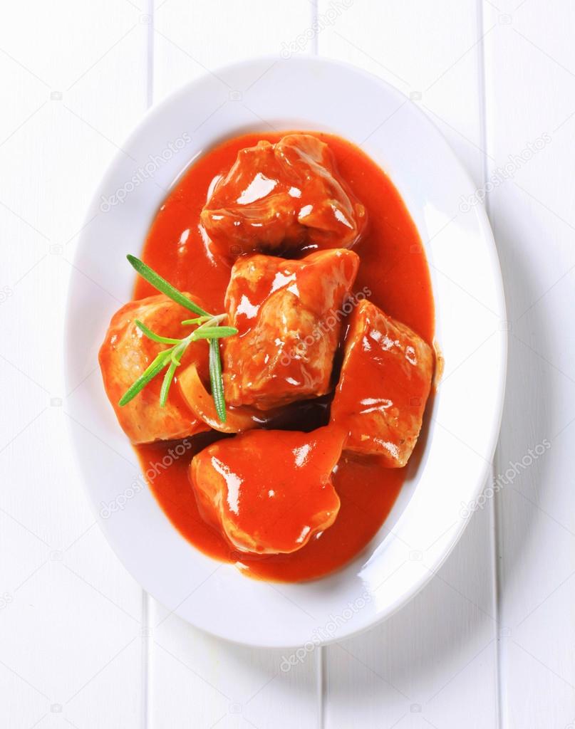 pork meat in tomato sauce