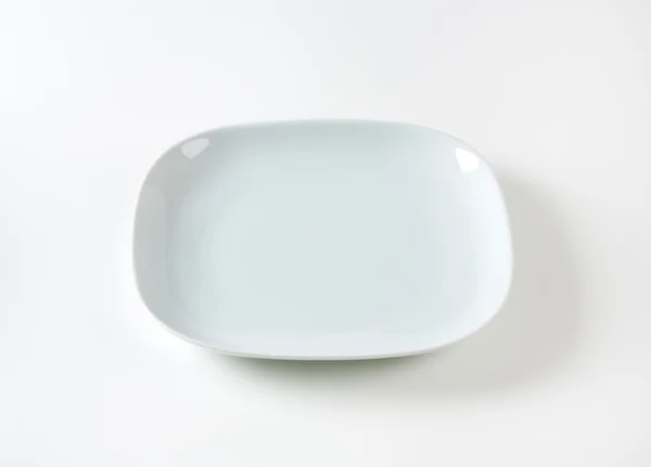 Square dinner plate — Stock Photo, Image