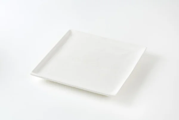 Τετράγωνης λευκής πιατέλα — Φωτογραφία Αρχείου