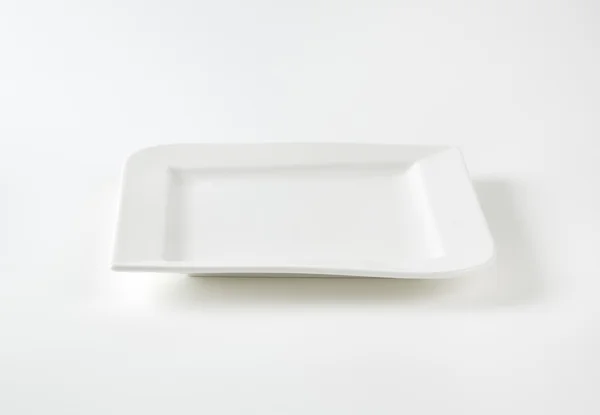 Square dinner plate — Stock Photo, Image