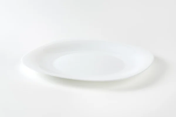 Белоснежная тарелка — стоковое фото