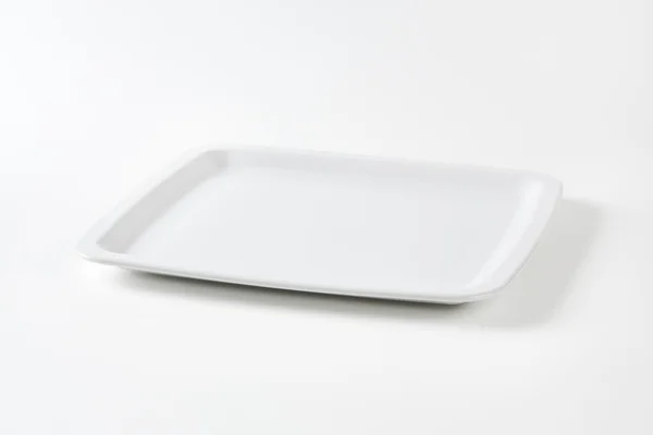 Square white plate Royalty Free Stock Images