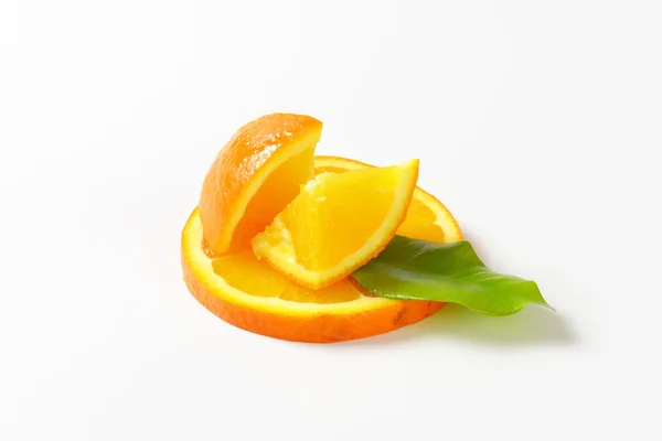 Fresh orange pieces — Stock Photo, Image