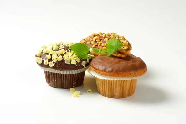 Drie geassorteerde muffins — Stockfoto