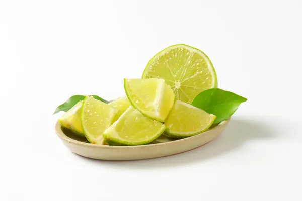 Pedaços de frutas frescas de limão — Fotografia de Stock