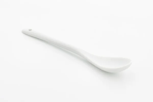 White porcelain spoon — Stock Photo, Image