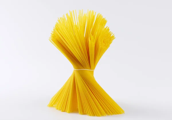 Bundle of uncooked spaghetti — Stock Photo, Image
