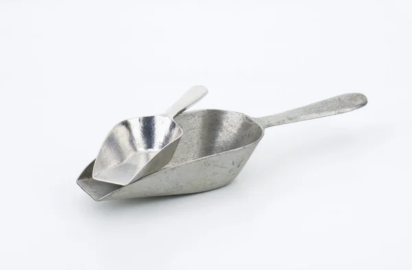 Two empty metal scoops — Stock Photo, Image