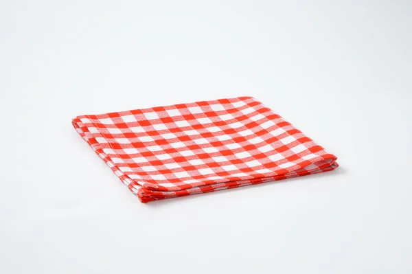 Красная и белая салфетка — стоковое фото