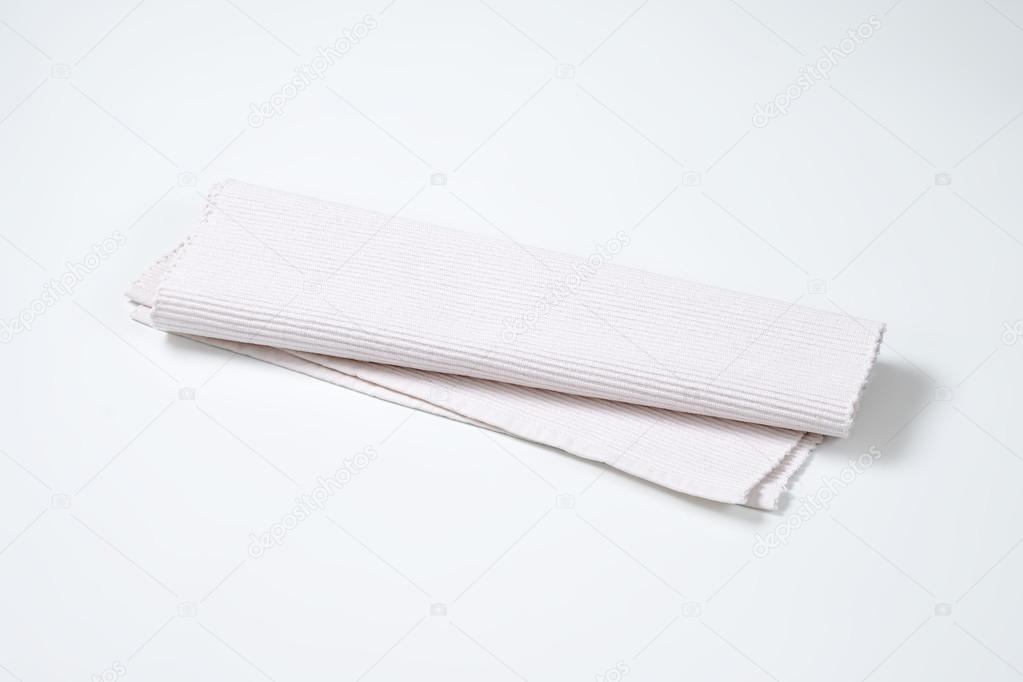 white cloth place mat