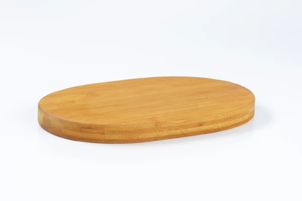 Placa de queijo de madeira oval — Fotografia de Stock