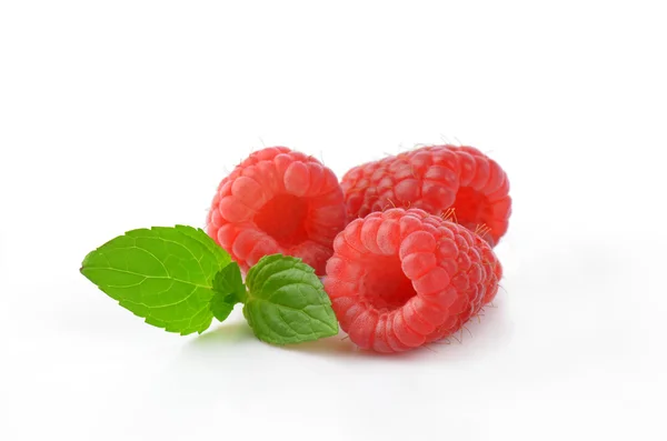 Three fresh raspberries — Stock Photo, Image