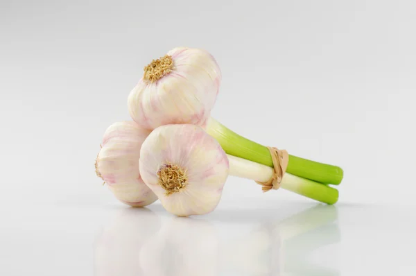 Three garlic bulbs — Stock Photo, Image