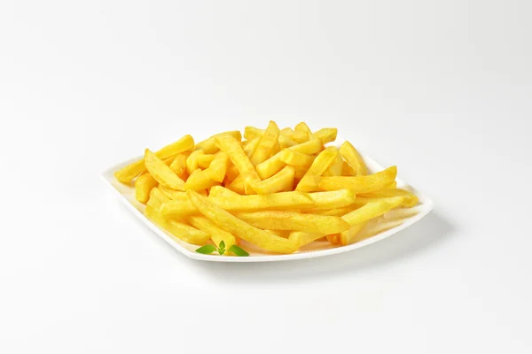 Porción de papas fritas —  Fotos de Stock