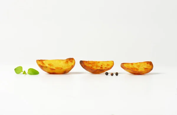 Drei Kartoffelkeile — Stockfoto