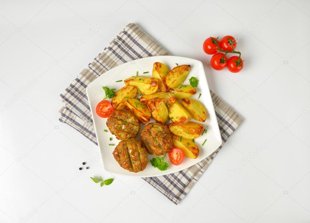 vegetable and cheese patties with potato wedges