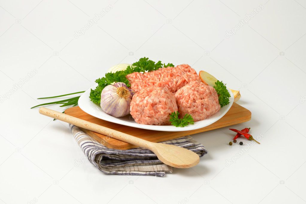 raw minced meat and meatballs