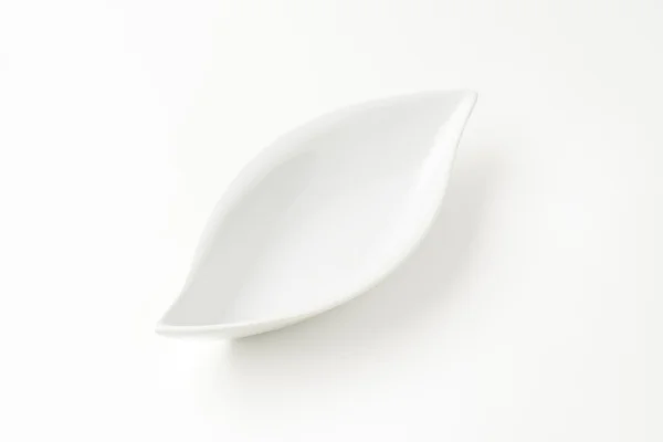 Böjda vit skål — Stockfoto