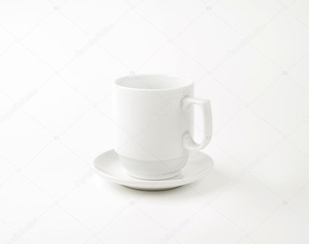 white coffee cup with saucer