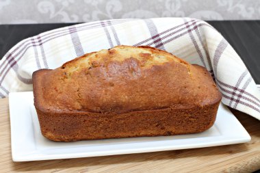 One whole pound cake, side view. clipart