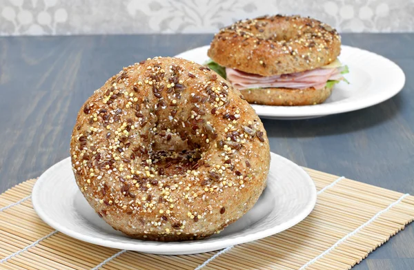 Whole grain, multi seeded bagels. — Stock Photo, Image