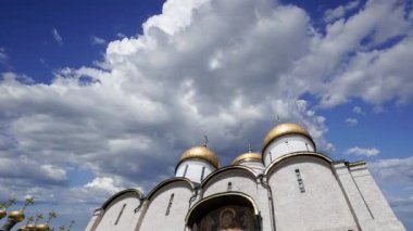 Assumption Cathedral(Cathedral of the Dormition,Uspensky sobor) against the moving clouds. Inside of Moscow Kremlin, Russia (day) 