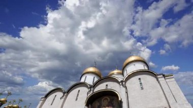 Assumption Cathedral(Cathedral of the Dormition,Uspensky sobor) against the moving clouds. Inside of Moscow Kremlin, Russia (day) 