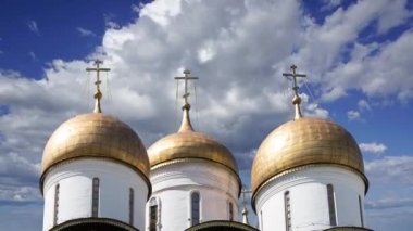 Assumption Cathedral(Cathedral of the Dormition,Uspensky sobor) against the moving clouds. Inside of Moscow Kremlin, Russia (day) 