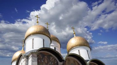 Assumption Cathedral(Cathedral of the Dormition,Uspensky sobor) against the moving clouds. Inside of Moscow Kremlin, Russia (day) 