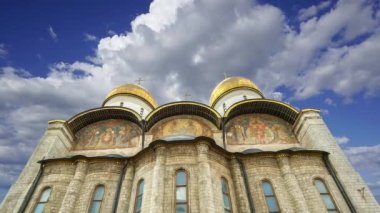 Assumption Cathedral(Cathedral of the Dormition,Uspensky sobor) against the moving clouds. Inside of Moscow Kremlin, Russia (day) 