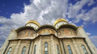 Assumption Cathedral(Cathedral of the Dormition,Uspensky sobor) against the moving clouds. Inside of Moscow Kremlin, Russia (day) 