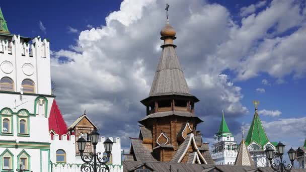 Church of St. Nicholas in Izmailovsky Kremlin (Kremlin in Izmailovo) against the moving clouds, Moscow, Russia. The new church, built in the traditions of Russian wooden architecture 