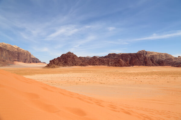 Wadi Rum Desert also known as The Valley of the Moon is a valley cut into the sandstone and granite rock in southern Jordan