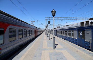 MOSCOW, RUSSIA - JUNE, 01 2015.Train on Moscow passenger platform (Yaroslavsky railway station), Russia-- is one of nine main railway stations in Moscow, situated on Komsomolskaya Square.