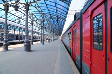 Train on Moscow passenger platform (Yaroslavsky railway station), Russia-- is one of nine main railway stations in Moscow, situated on Komsomolskaya Square. clipart