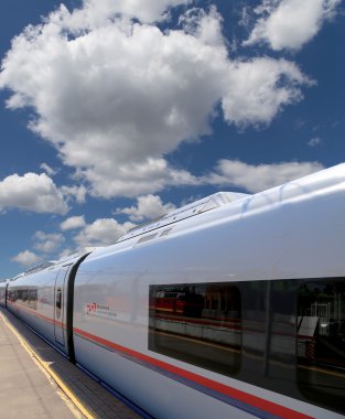 MOSCOW, RUSSIA - JUNE, 03 2015-- Aeroexpress Train Sapsan against the sky-- high-speed train acquired OAO Russian Railways for use on the Russian high-speed railways