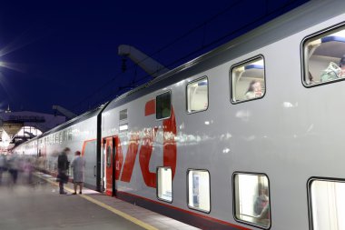 MOSCOW, RUSSIA - JUNE, 05 2015.Train on Leningrad railway station at night -- is one of the nine main railway stations of Moscow, Russia