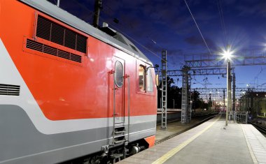 MOSCOW, RUSSIA - JUNE, 05 2015.Train on Leningrad railway station at night -- is one of the nine main railway stations of Moscow, Russia