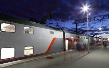 MOSCOW, RUSSIA - JUNE, 05 2015.Train on Leningrad railway station at night -- is one of the nine main railway stations of Moscow, Russia