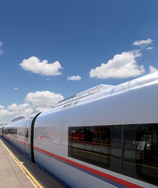 MOSCOW, RUSSIA - JUNE, 03 2015-- Aeroexpress Train Sapsan against the sky-- high-speed train acquired OAO Russian Railways for use on the Russian high-speed railways