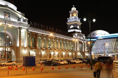 Kiyevskaya railway station  lit at night, Moscow, Russia