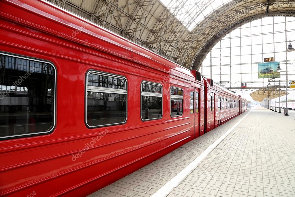 Aeroexpress red Train on Kiyevskaya railway station  (Kiyevsky railway terminal,  Kievskiy vokzal) -- is one of the nine main railway stations of Moscow, Russia