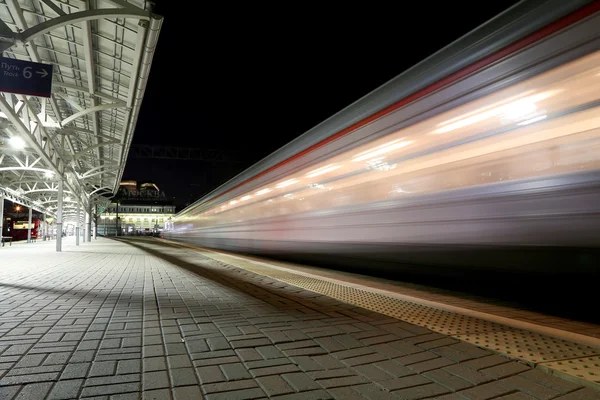 Train on Moscow passenger platform at night (Belorussky railway station) is one of the nine main railway stations in Moscow, Russia. — 스톡 사진