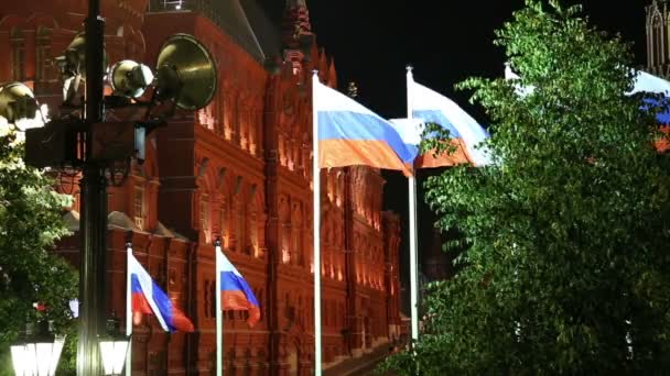 Flags of Russia at night in Moscow, Russia — Wideo stockowe