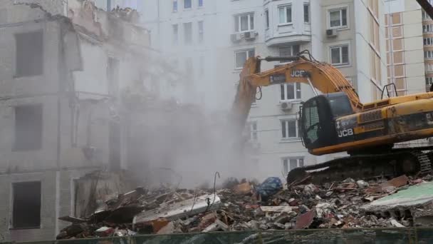 Excavator machinery working on demolition old house. — Stock Video