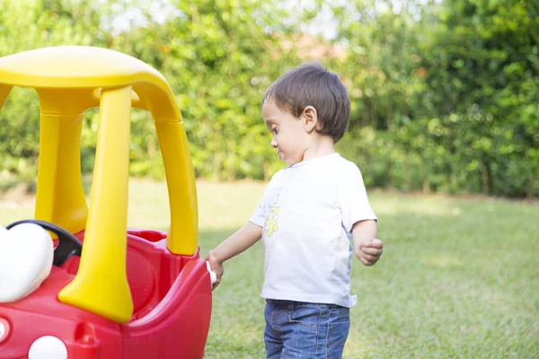 Happy Little Boy Driving His Toy — Stock Photo, Image