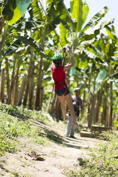 Happy Girl Enjoying Zip Adventure